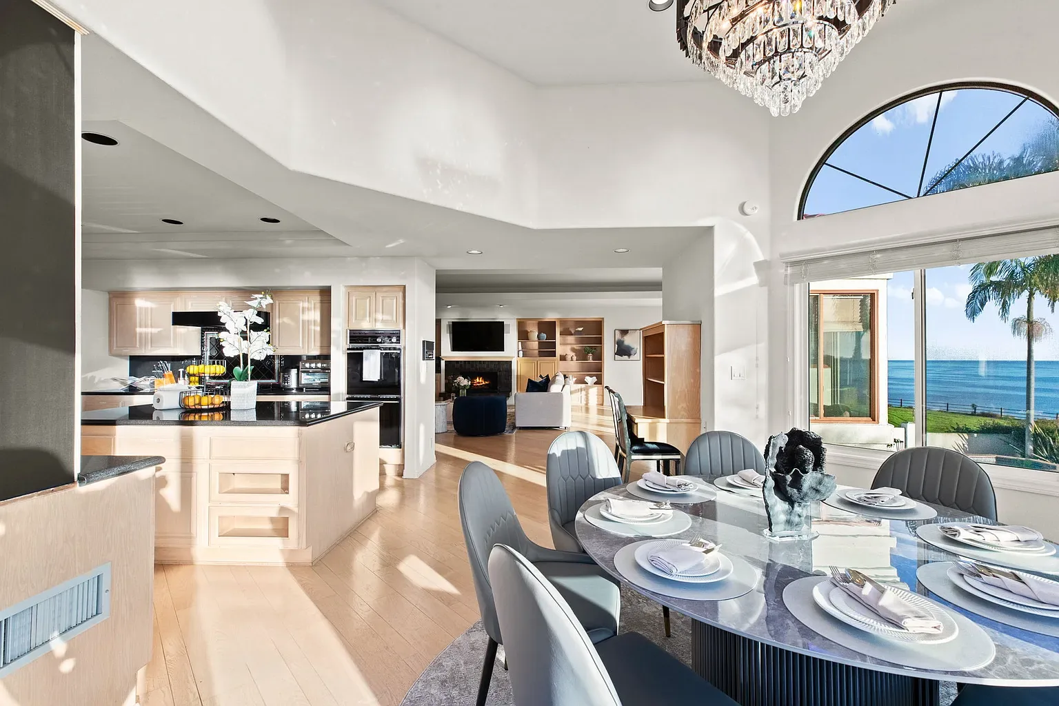 Open kitchen and dining with ocean views