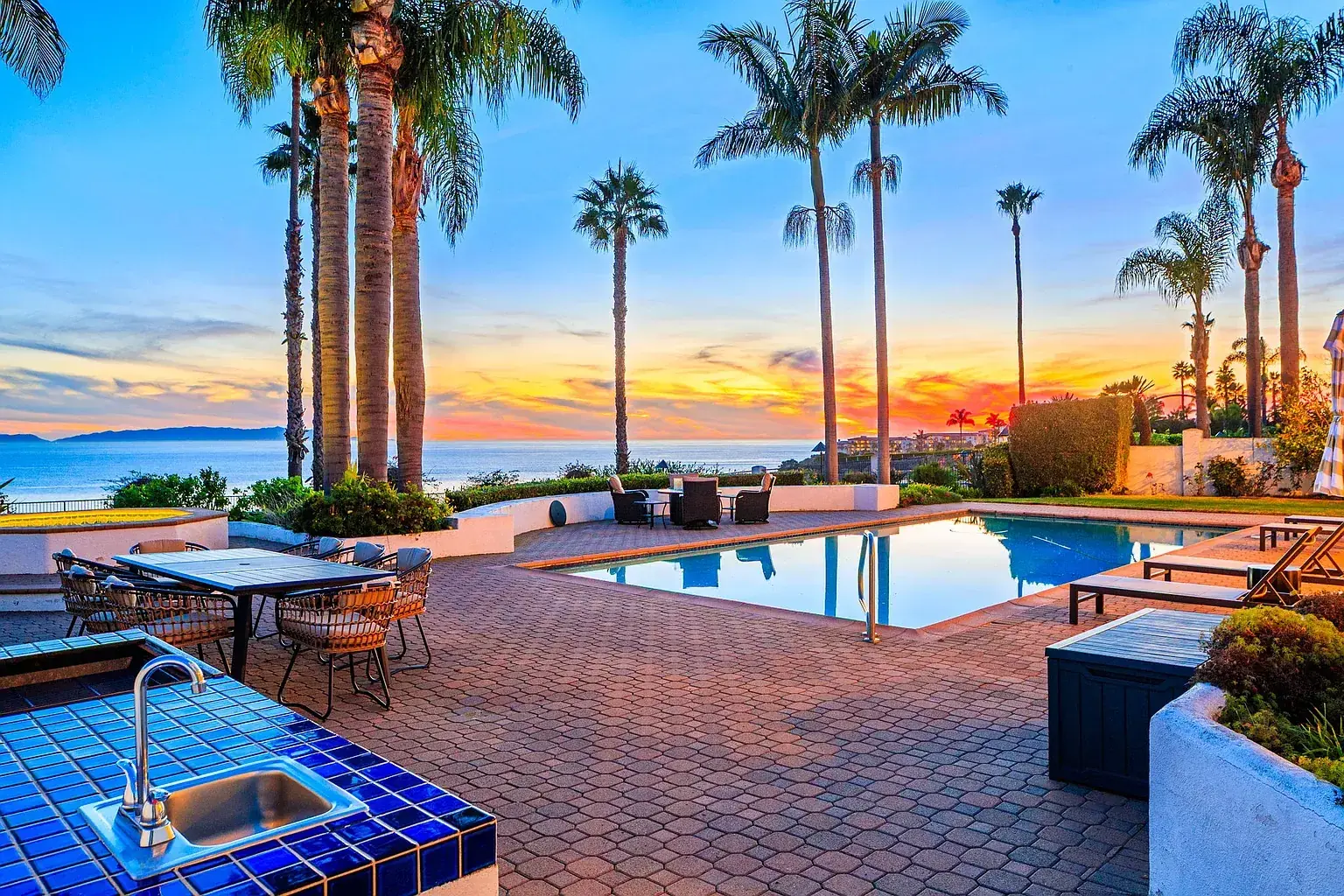 The Sakina House residence and pool at sunset on the Palos Verdes coast
